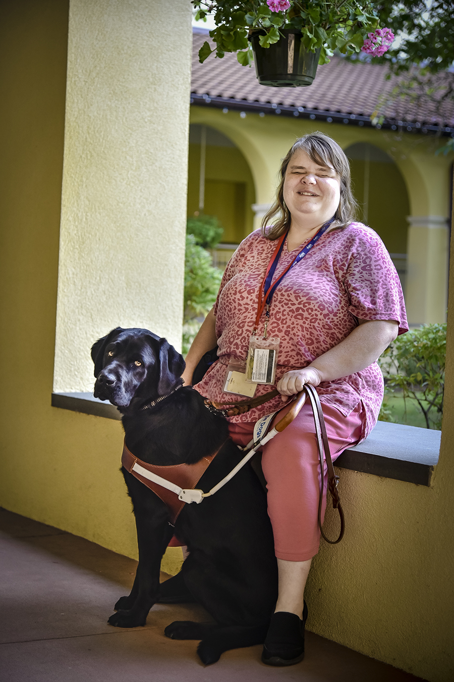 Ms. Ilniski with her guide dog Marvin