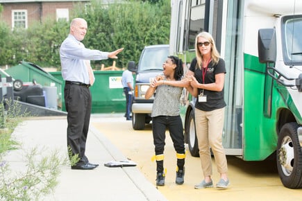 Mr. Reeves Greets a Student at the Bus Turnaround