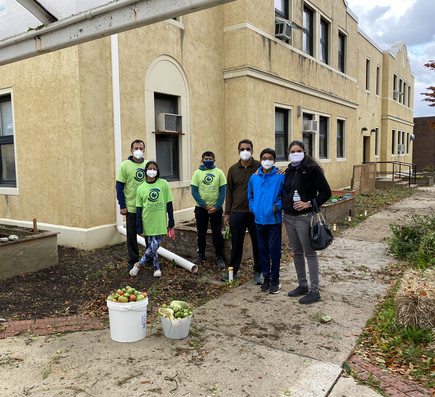 Some of OSB's Volunteers cleaning the gardens.