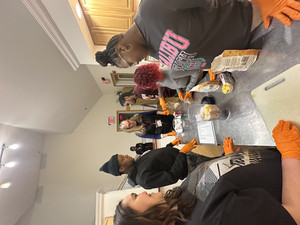 Students preparing healthy meal in Whitehall kitchen